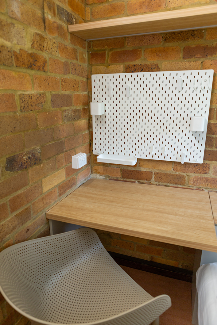 Desk chair and notice board