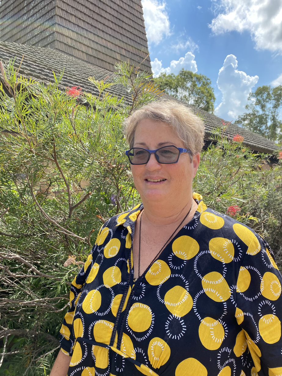 woman in black and yellow shirt