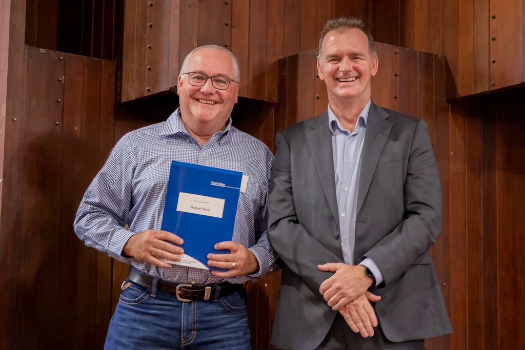 Farm manager receiving diploma