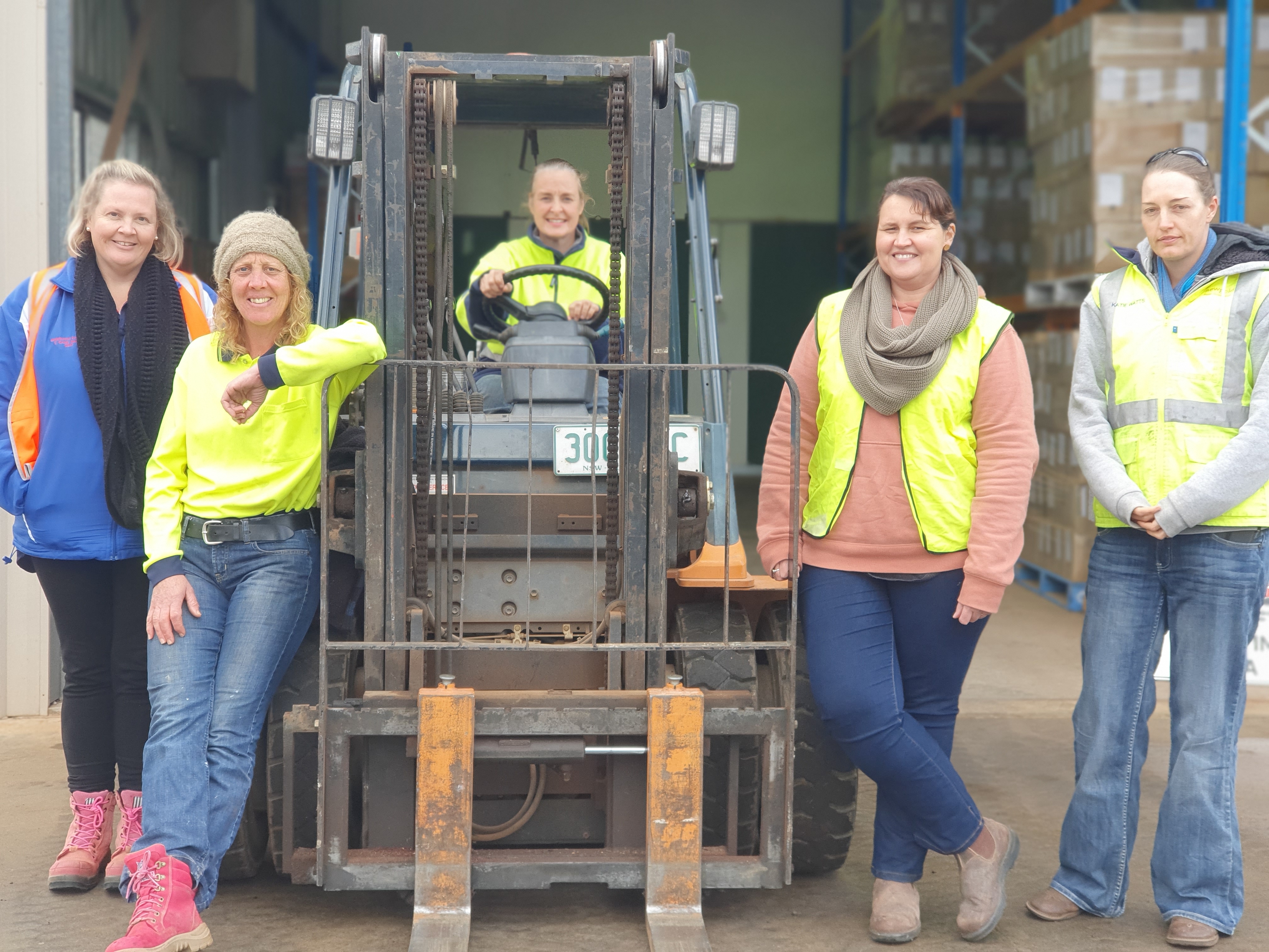 5 women at a forklift course